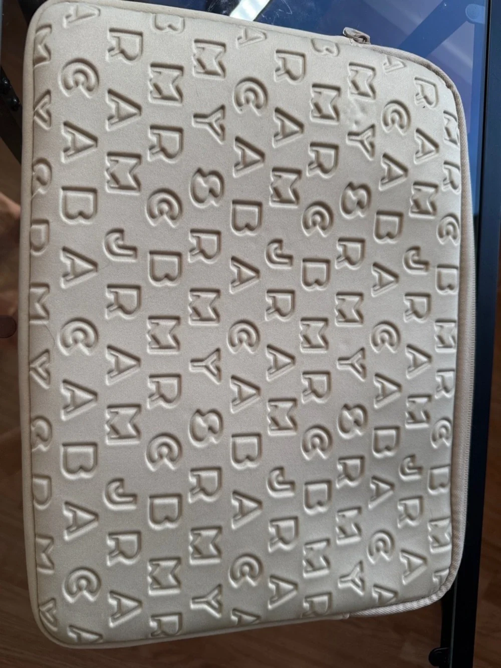 13” Marc by Marc Jacobs Cream Embossed Logo Laptop Sleeve with Gold Plate